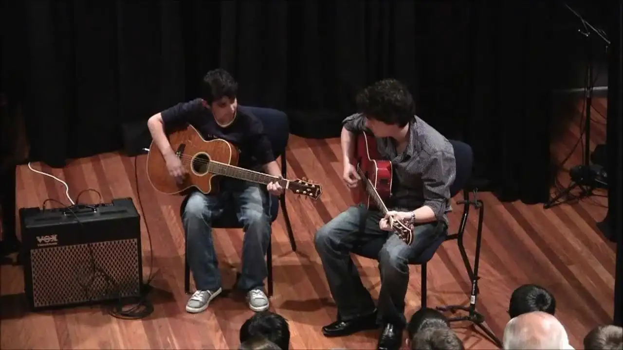 Nick playing guitar