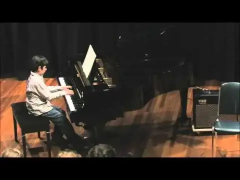 Nick playing guitar years ago